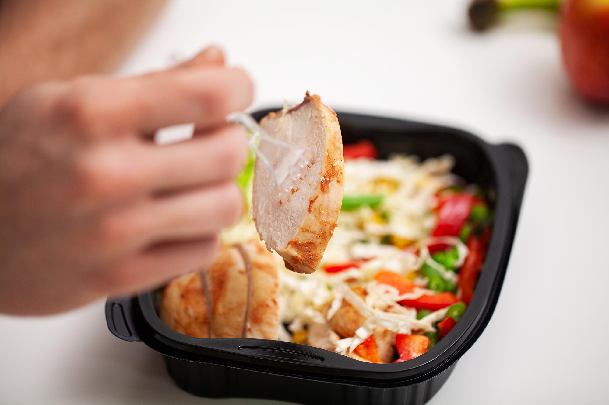 Closeup of prepared meal in delivery container